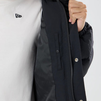 The model is wearing this New Era Down Jacket in black. 7