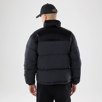 The model is wearing this New Era Down Jacket in black. 2