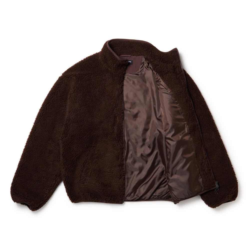 The model is wearing this New Era Blouson Jacket in dark brown. 8