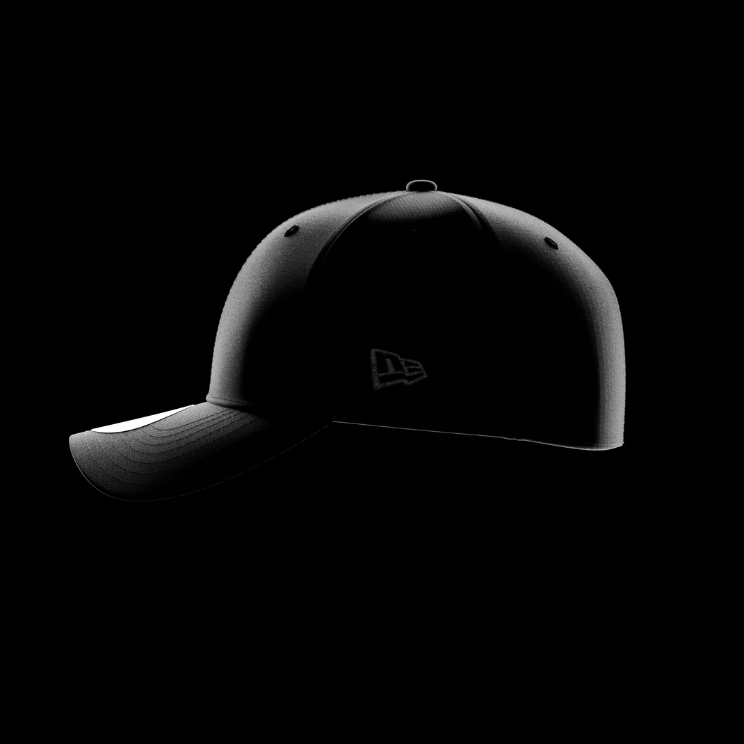 A black 39THIRTY cap shown in side profile against a solid black background, featuring a subtle tonal New Era Flag on the side and a structured curved brim.