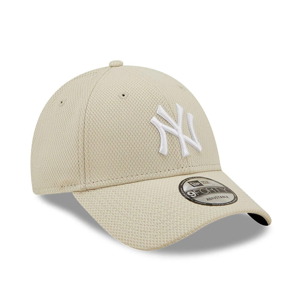 New York Yankees Diamond Era Stone New Era 9FORTY Cap, three-quarter view showing the raised white Yankees logo on the front panel, curved visor with a 9FORTY size sticker, and an adjustable strap at the back.