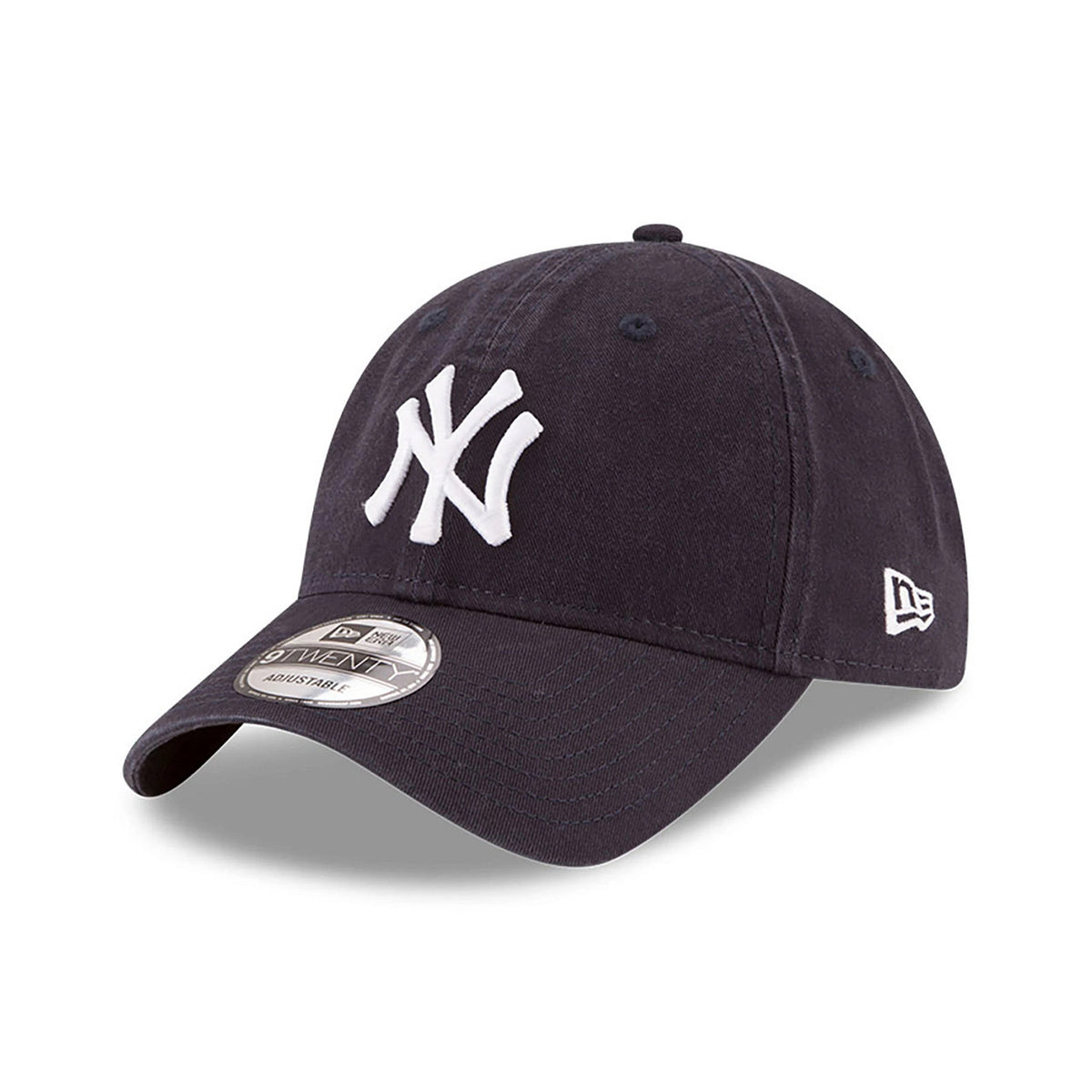 New York Yankees MLB Core Classic Navy New Era 9TWENTY Adjustable Cap, three-quarter view showing the raised white NY logo on the front panel, curved visor with a 9TWENTY size sticker, and New Era flag logo on the left side.