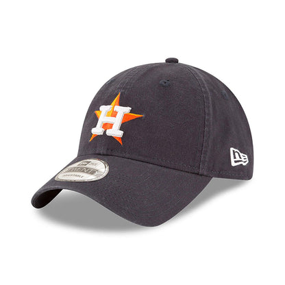 Houston Astros MLB Core Classic Blue New Era 9TWENTY Adjustable Cap, three-quarter view showing the orange and white embroidered H logo on the front panel, white New Era flag logo on the left side and 9TWENTY size sticker on the curved visor.