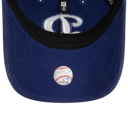 LA Dodgers MLB Core Classic Blue New Era 9TWENTY Adjustable Cap, inside view showing black sweatband and taping with a baseball sticker on the navy undervisor, beneath an embroidered LA logo.