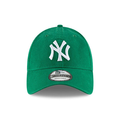 New York Yankees MLB Core Classic Green New Era 9TWENTY Adjustable Cap, front view showing the raised white NY logo embroidered on the structured green front panel and a 9TWENTY size sticker on the green visor.