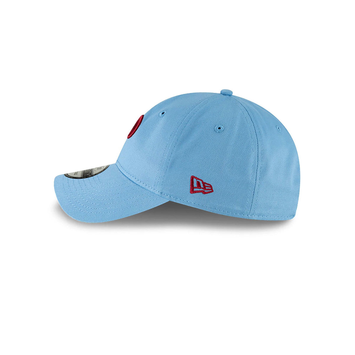 Philadelphia Phillies MLB Core Classic Pastel Blue New Era 9TWENTY Adjustable Cap, side view showing the red New Era flag logo on the left side and a curved visor with a 9TWENTY size sticker, on a structured pastel blue crown.