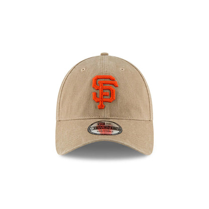 San Francisco Giants MLB Core Classic Beige New Era 9TWENTY Adjustable Cap, front view showing the flat embroidered orange SF logo on the front panel with a curved visor and centred 9TWENTY size sticker.