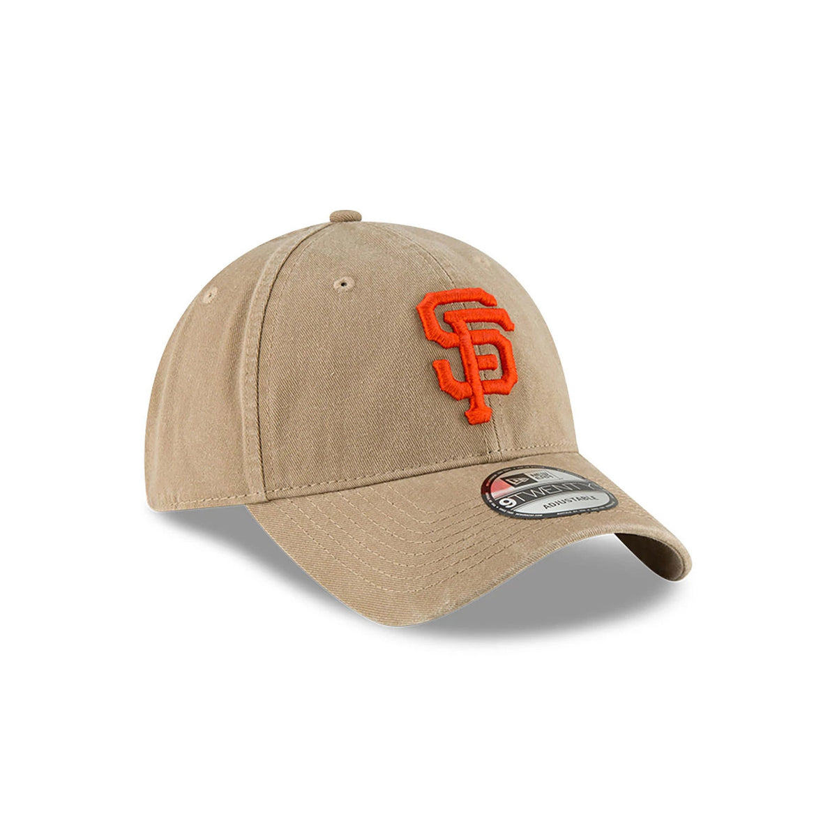 San Francisco Giants MLB Core Classic Beige New Era 9TWENTY Adjustable Cap, three-quarter view showing orange embroidered SF logo on the front panel and a 9TWENTY size sticker on the curved beige visor.