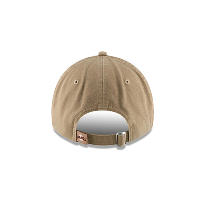 San Francisco Giants MLB Core Classic Beige New Era 9TWENTY Adjustable Cap, rear view showing the Giants wordmark embroidered on the beige fabric strap above a silver buckle, centred on the unstructured crown.