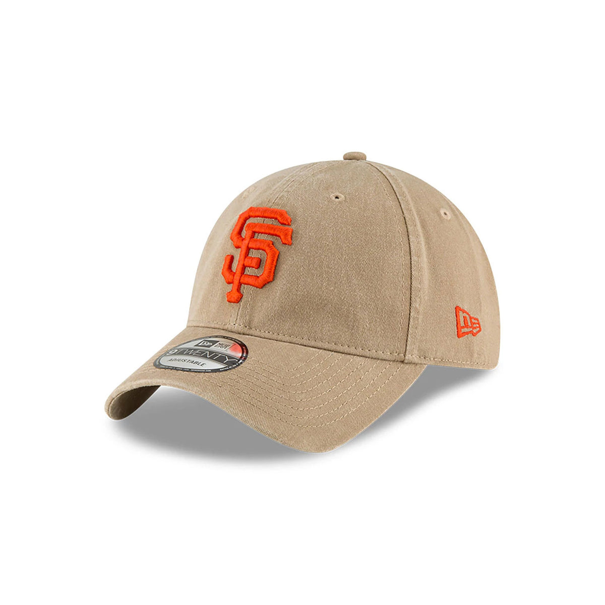 San Francisco Giants MLB Core Classic Beige New Era 9TWENTY Adjustable Cap, three-quarter view showing the raised orange SF logo on the front panel, curved visor with a 9TWENTY size sticker, and New Era flag logo on the left side.