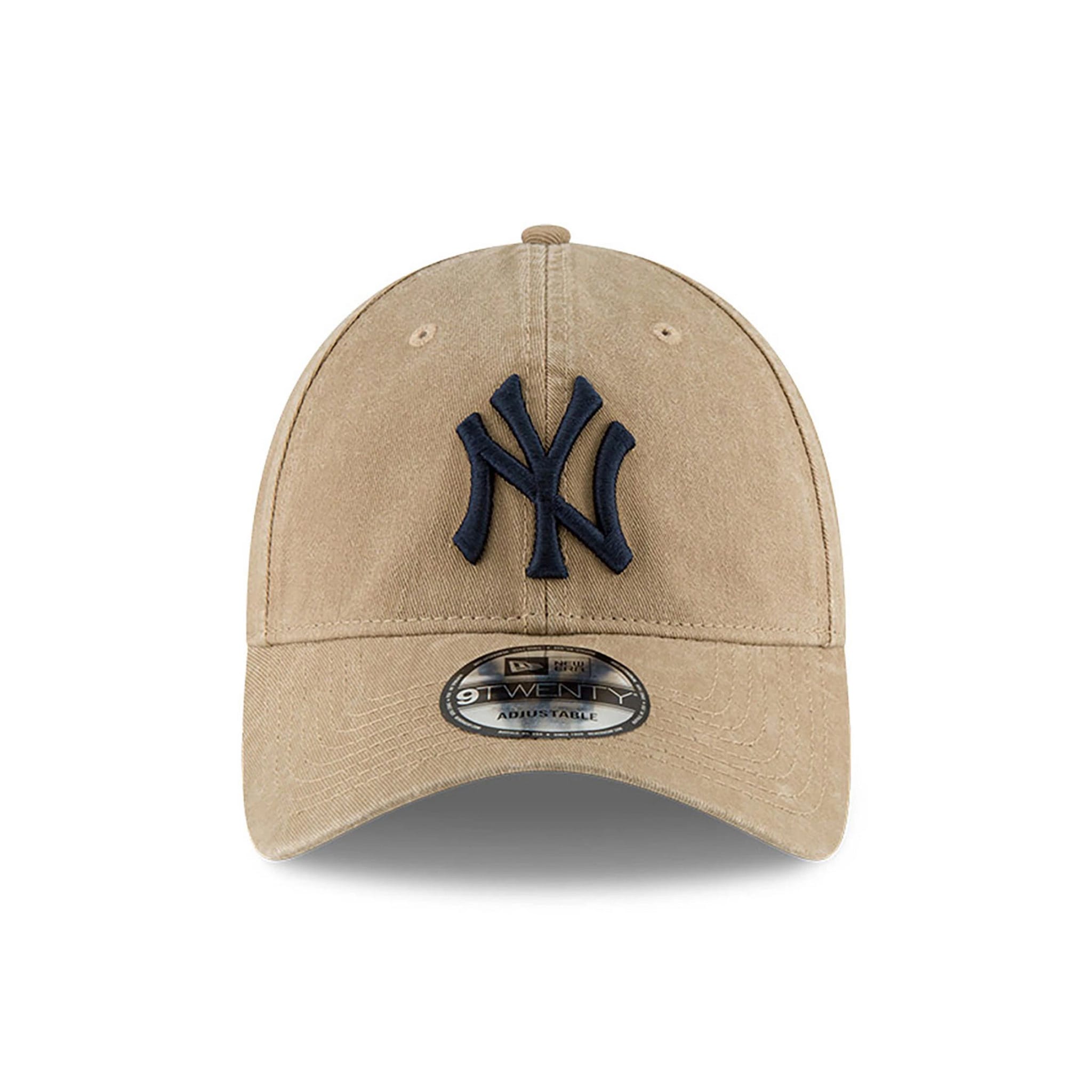 New York Yankees MLB Core Classic Beige New Era 9TWENTY Adjustable Cap, front view showing the raised embroidered navy NY logo on the front panel and a 9TWENTY size sticker on the beige curved visor.