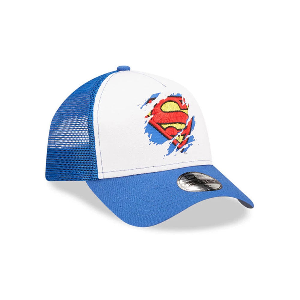 Child DC Superman White New Era 9FORTY A-Frame Trucker Adjustable Cap, three-quarter view showing the red and yellow Superman logo on the white front panel, blue mesh back, blue visor, and 9FORTY size sticker on top of the visor.