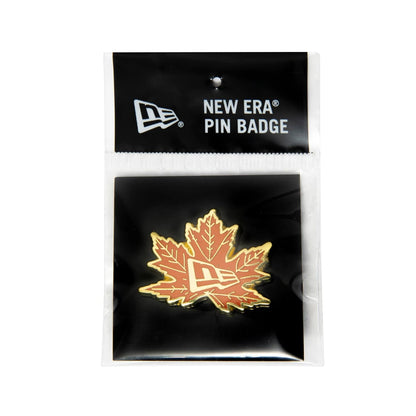 This is a New Era Leaf Logo Gold Pin Badge 3