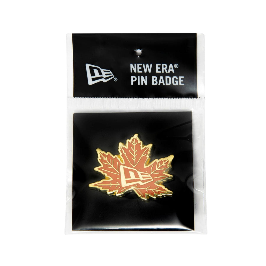 This is a New Era Leaf Logo Gold Pin Badge 3