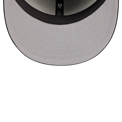 New York Yankees MLB Evergreen Black New Era 59FIFTY Fitted Cap, inside view showing the grey undervisor, black sweatband, white internal taping and part of the 59FIFTY size sticker on the underside of the visor.