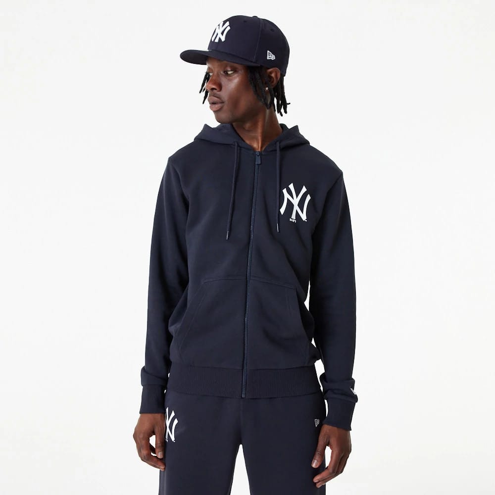 The Male model is wearing New York Yankees MLB Essential Navy Full Zip Hoodie 1