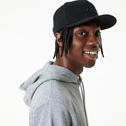 The Male model is wearing New Era Essential Grey Pullover Hoodie 7