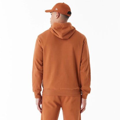 The Male model is wearing New York Yankees League Essential Brown Oversized Pullover Hoodie 6