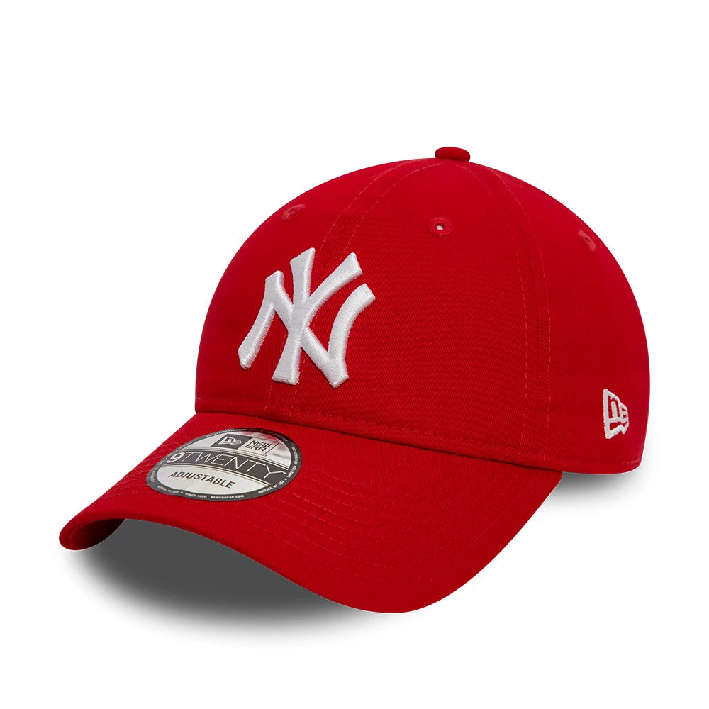 New York Yankees League Essential Red New Era 9TWENTY Adjustable Cap, three-quarter view showing raised white NY logo on red front panel, curved visor with 9TWENTY size sticker, and embroidered New Era flag logo on the left side.