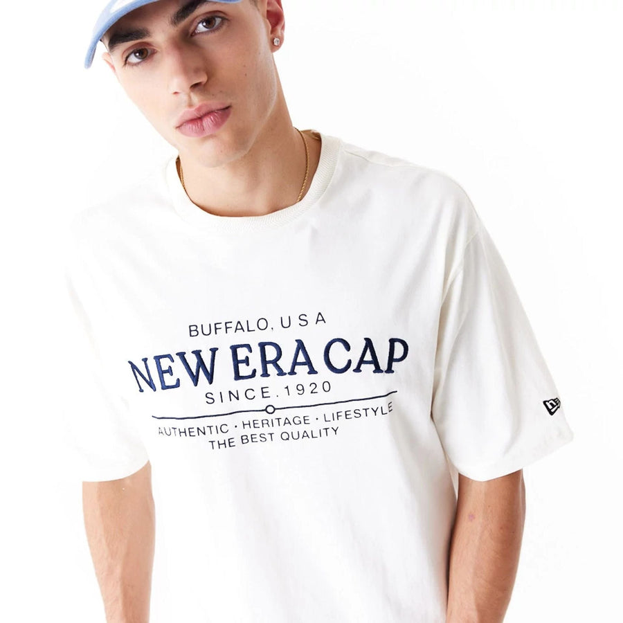 The Male model is wearing New Era Graphic White Oversized T-Shirt 5