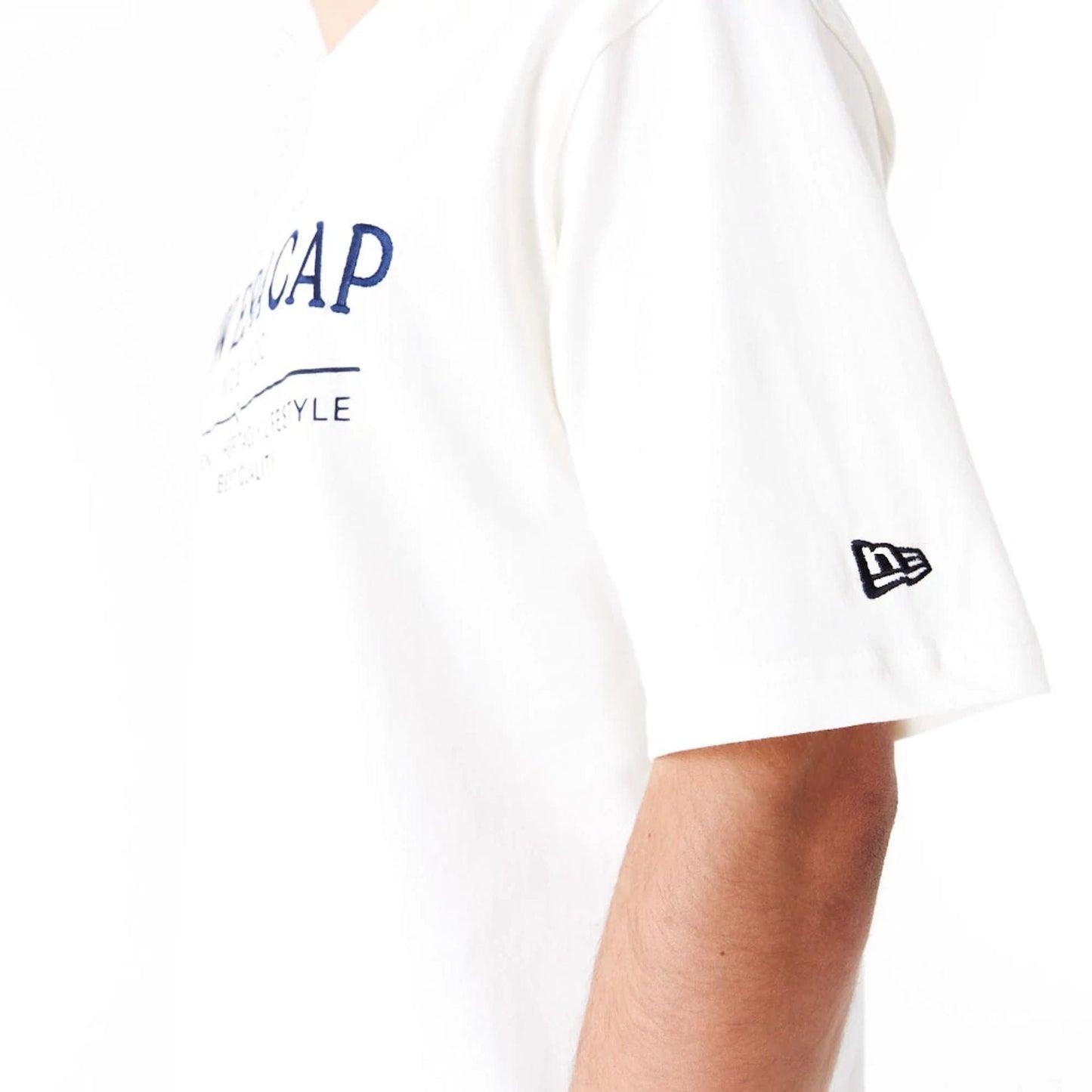 The Male model is wearing New Era Graphic White Oversized T-Shirt 7