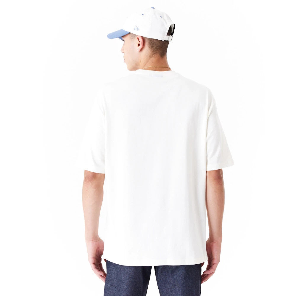 The Male model is wearing New Era Graphic White Oversized T-Shirt 2