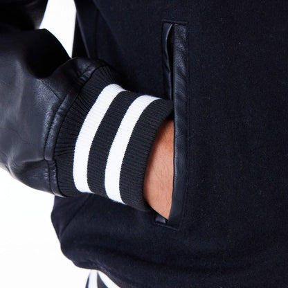 The Male model is wearing New Era Black Varsity Jacket 5