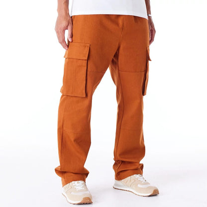 The Male model is wearing New Era Brown Cargo Trousers 10