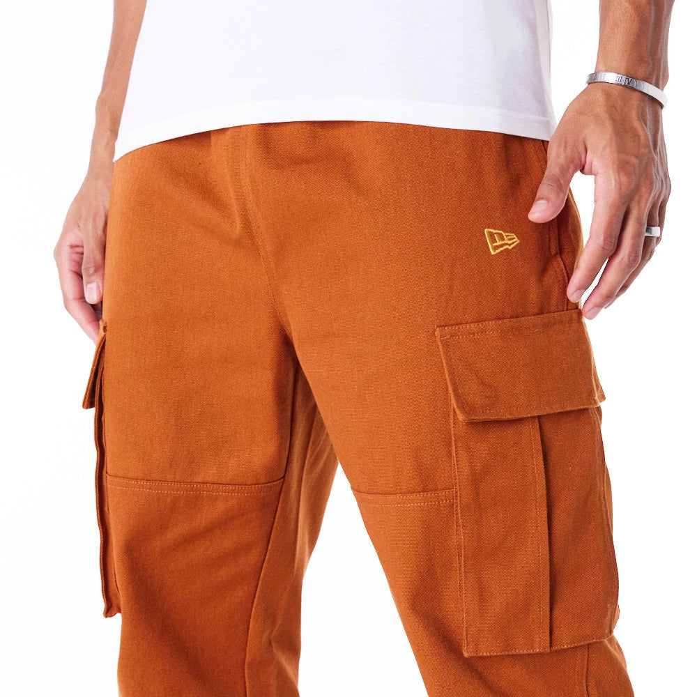 The Male model is wearing New Era Brown Cargo Trousers 8
