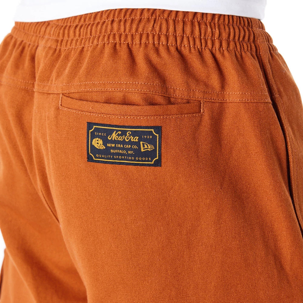 The Male model is wearing New Era Brown Cargo Trousers 9
