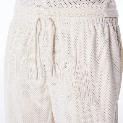 The Male model is wearing New Era Mesh Stone Oversized Shorts 4