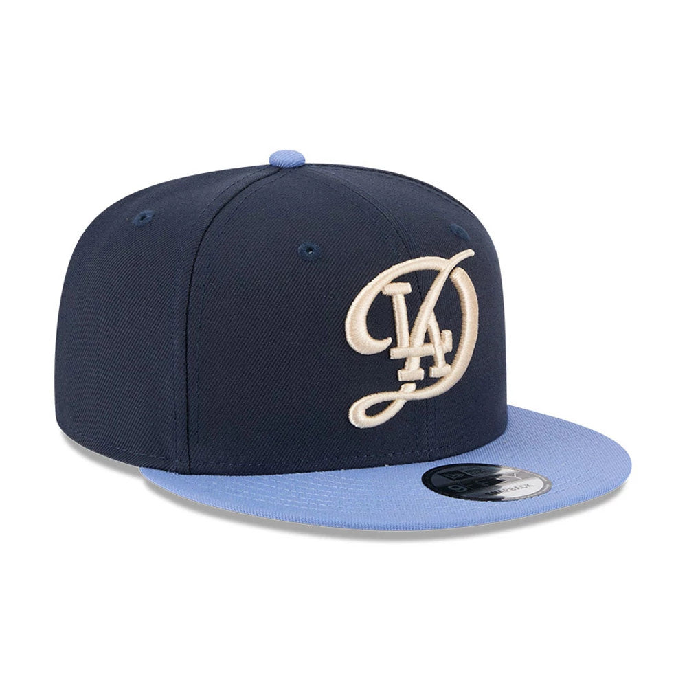 Pictured is this MLB Evergreen LA Dodgers 9FIFTY Snapback cap in dark blue. 4