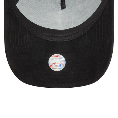 New York Yankees Faux Suede Black New Era 9FORTY E-Frame Cap, inside view showing the black sweatband and light grey taping, with a small baseball-shaped sticker on the black undervisor.