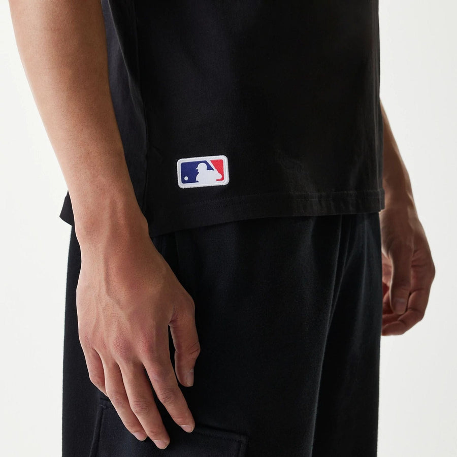 The Male model is wearing Miami Marlins MLB Regular Black T-Shirt 6
