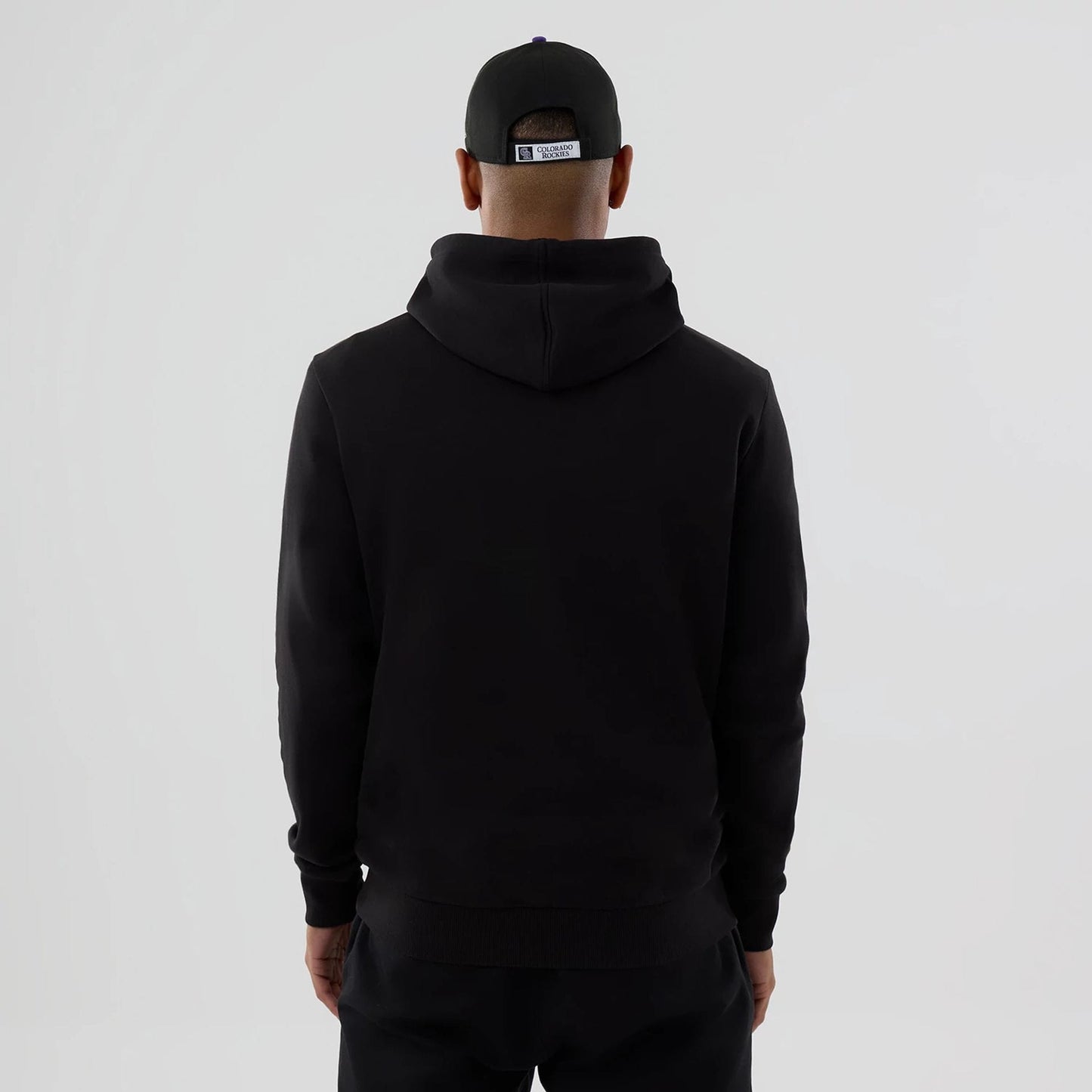 The Male model is wearing Colorado Rockies MLB Black Pullover Hoodie 2