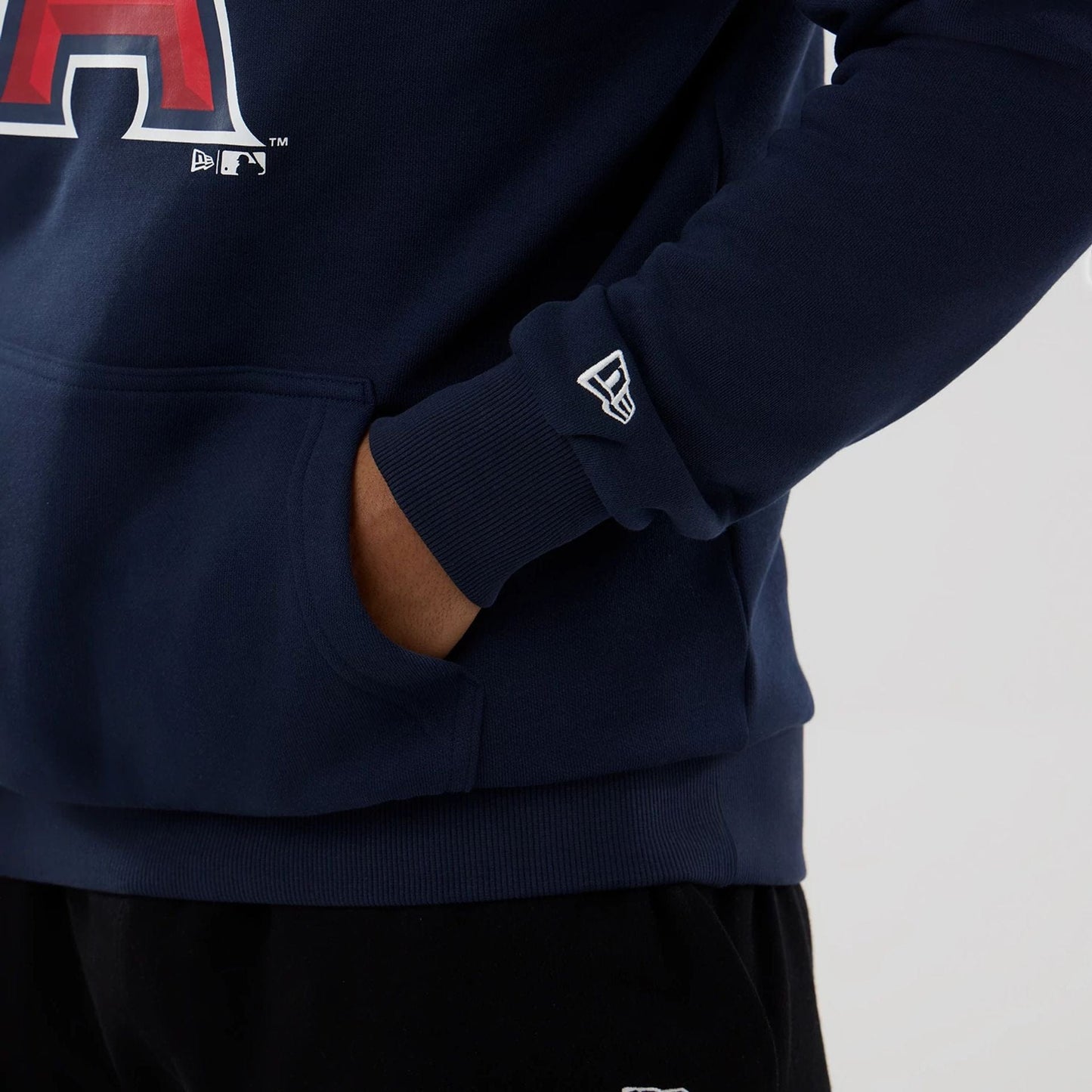 The Male model is wearing LA Angels MLB Dark Blue Pullover Hoodie 5