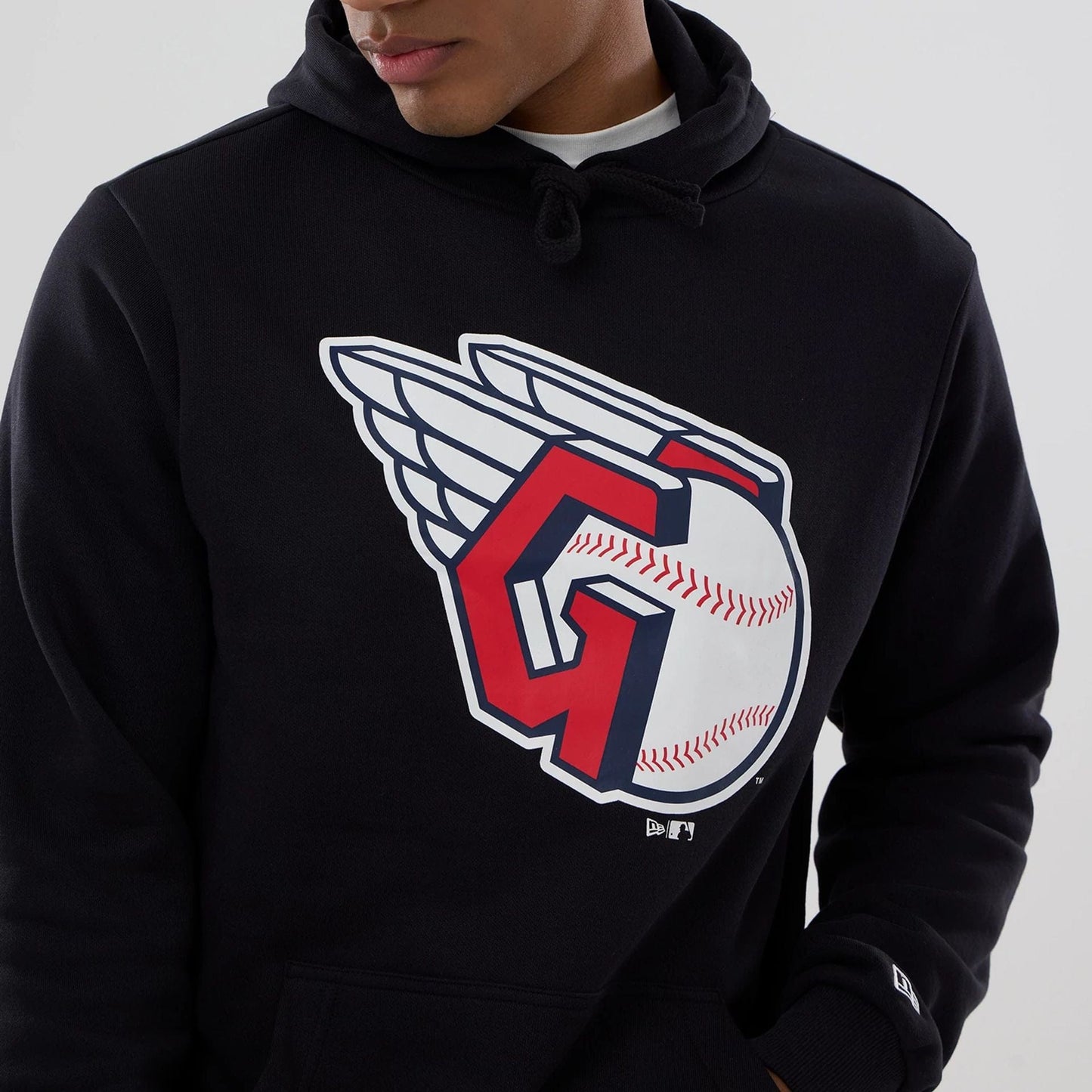 The Male model is wearing Cleveland Guardians MLB Navy Pullover Hoodie 5