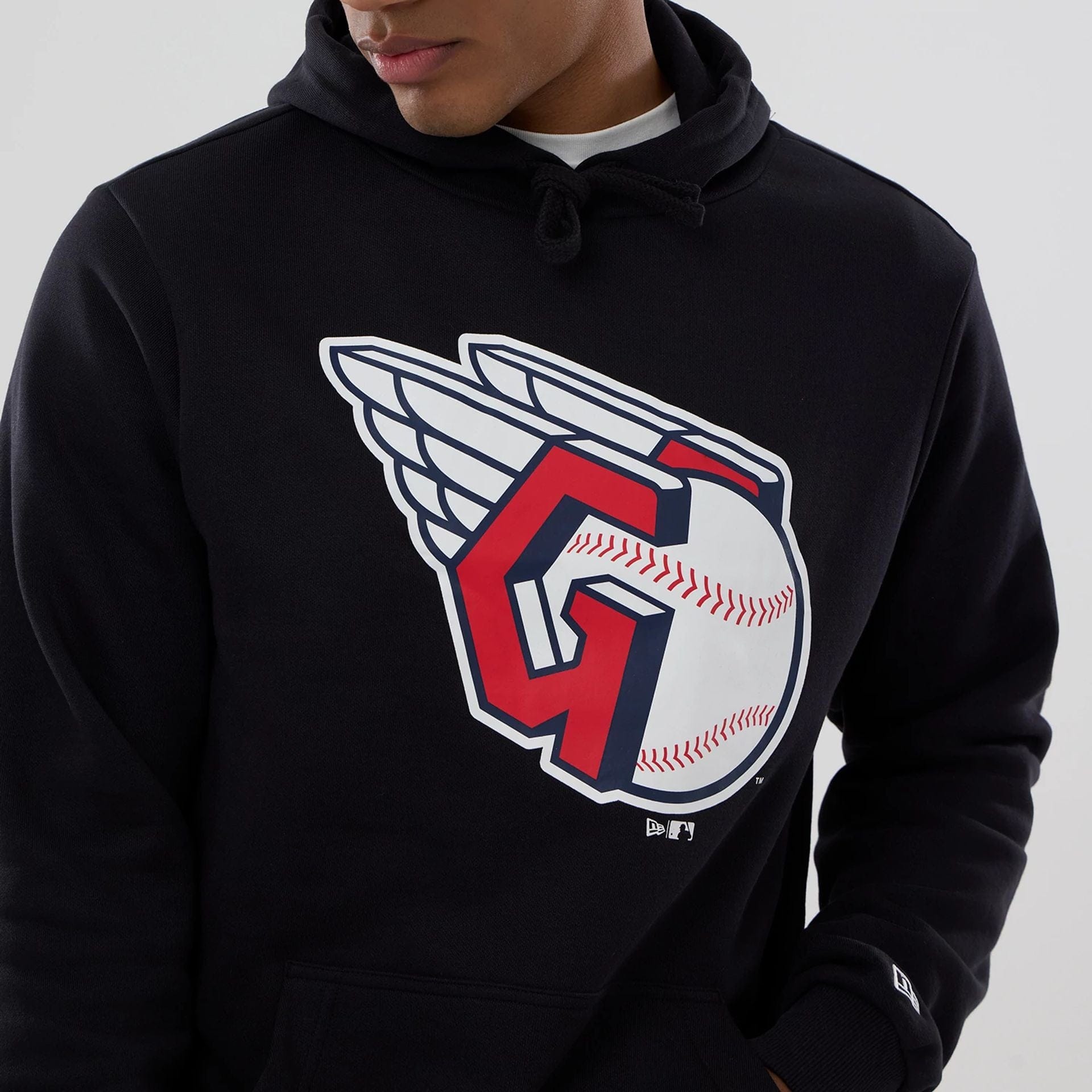 The Male model is wearing Cleveland Guardians MLB Navy Pullover Hoodie 5