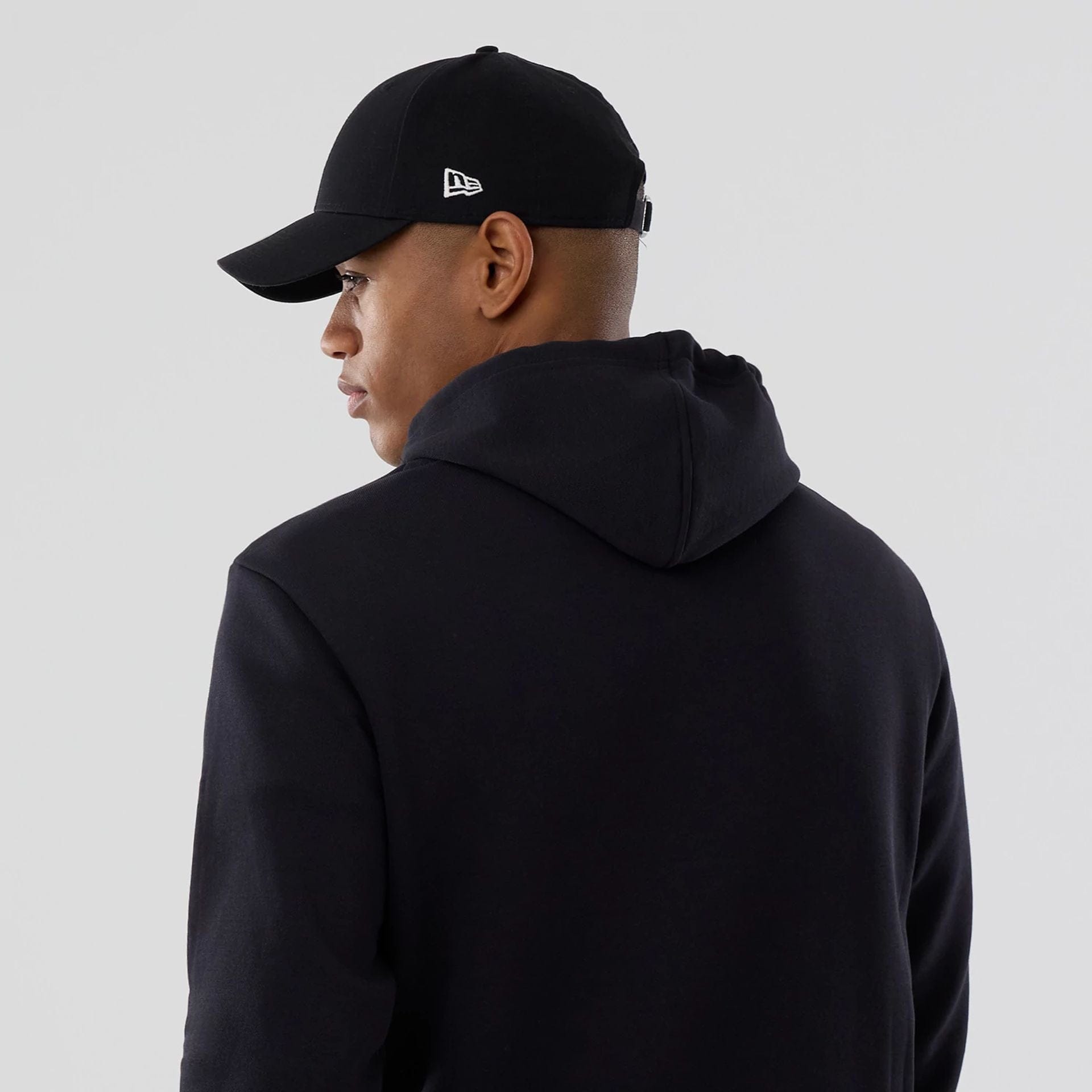 The Male model is wearing Cleveland Guardians MLB Navy Pullover Hoodie 7