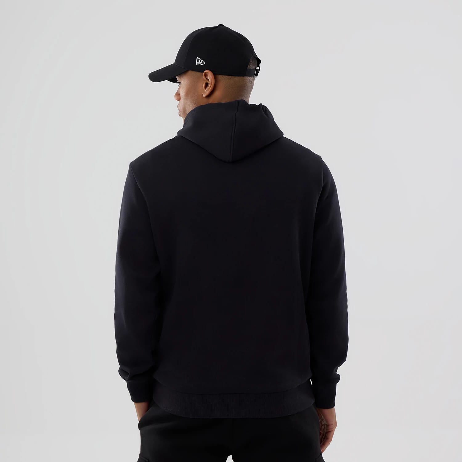 The Male model is wearing Cleveland Guardians MLB Navy Pullover Hoodie 2