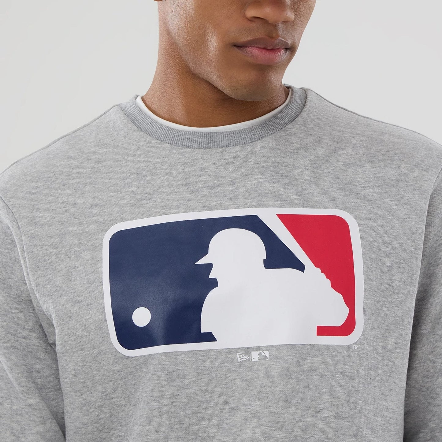 The Male model is wearing MLB Generic Logo Grey Crew Neck Sweater 4
