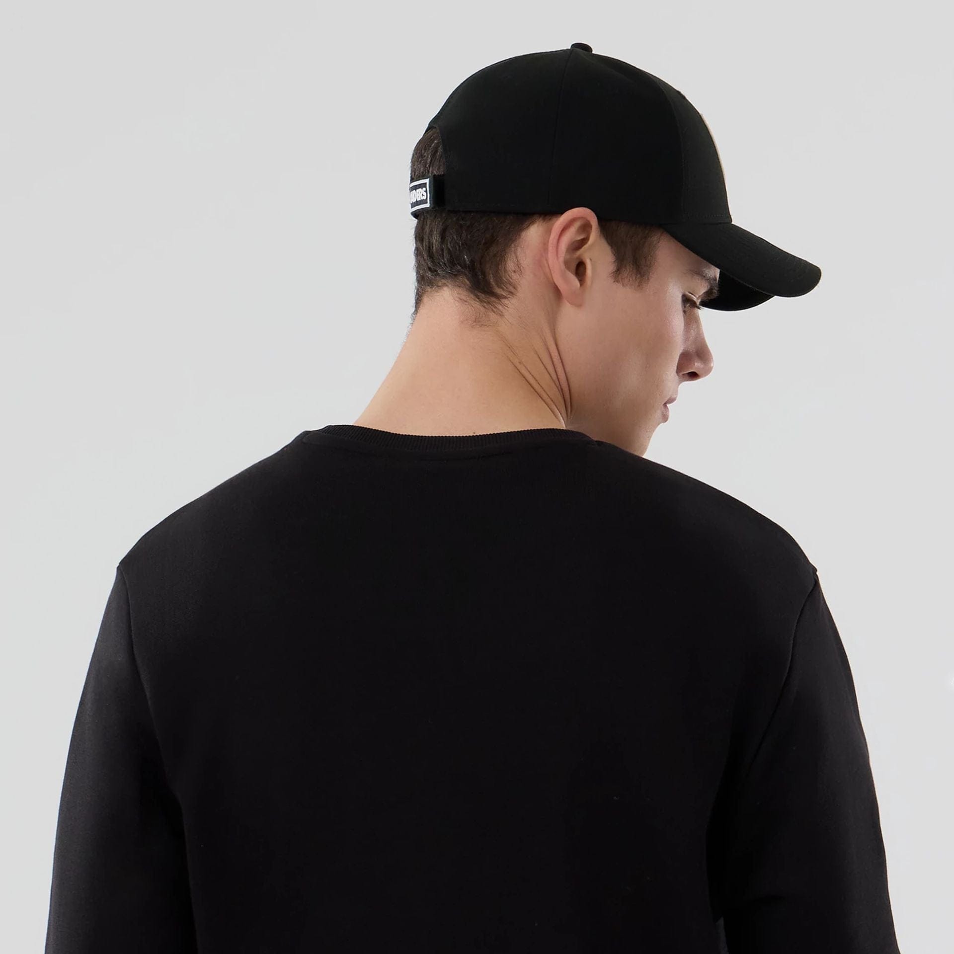 The Male model is wearing Las Vegas Raiders NFL Black Crew Neck Sweater 6