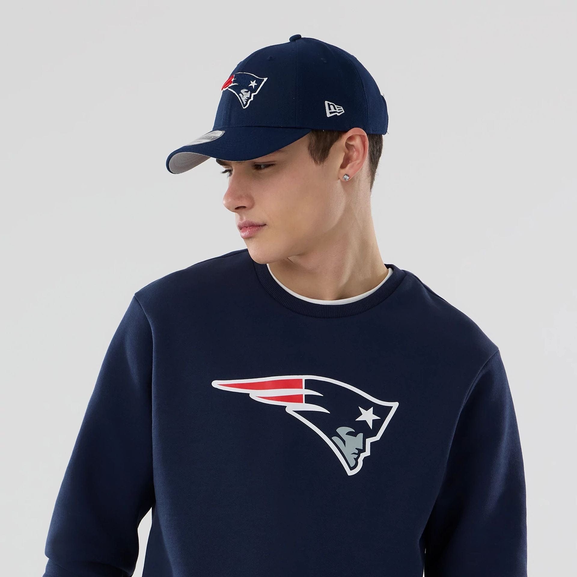 The Male model is wearing New England Patriots NFL Dark Blue Crew Neck Sweater 6