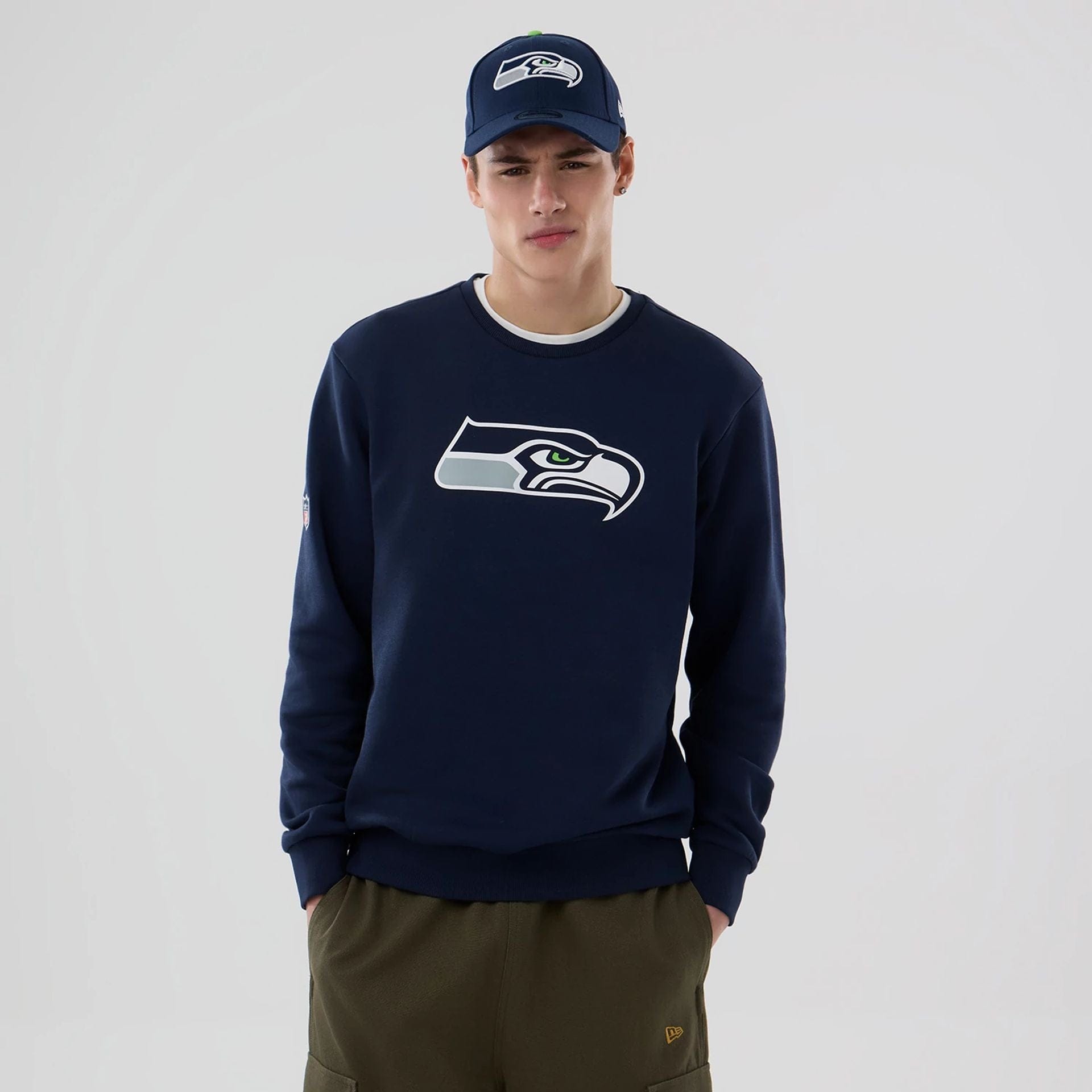 The Male model is wearing Seattle Seahawks NFL Dark Blue Crew Neck Sweater 1