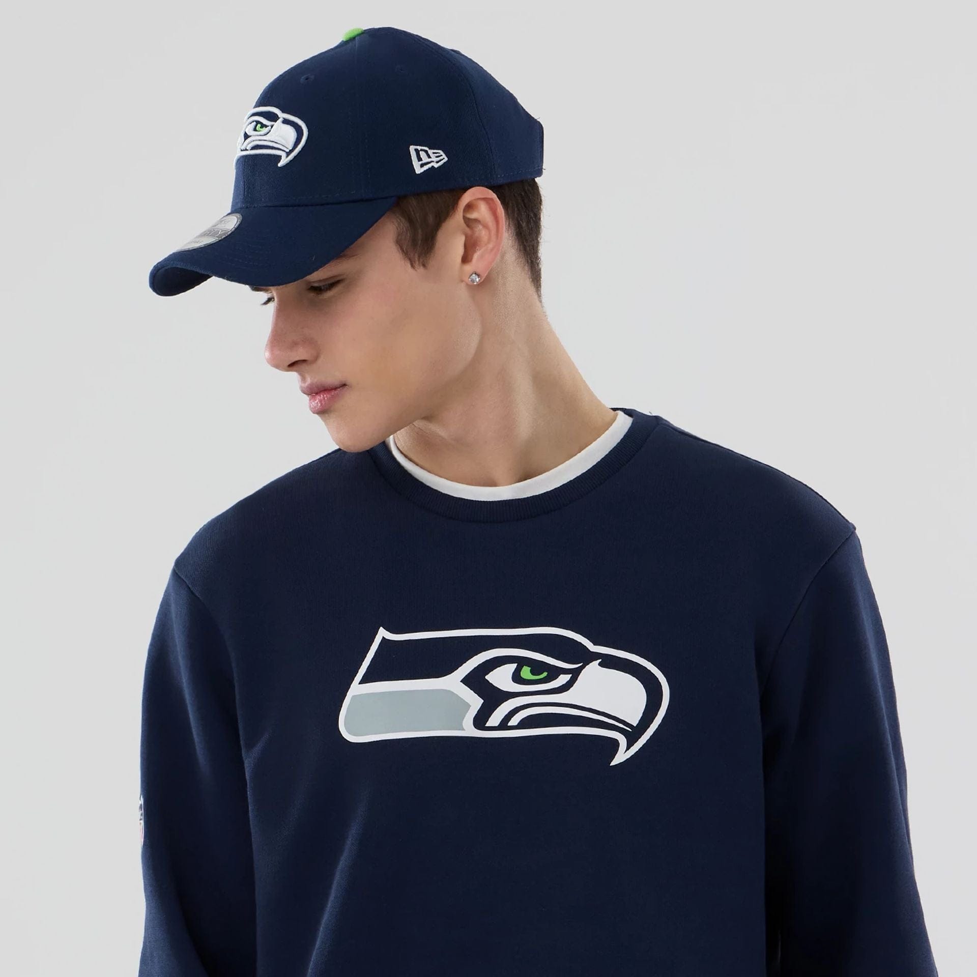 The Male model is wearing Seattle Seahawks NFL Dark Blue Crew Neck Sweater 6