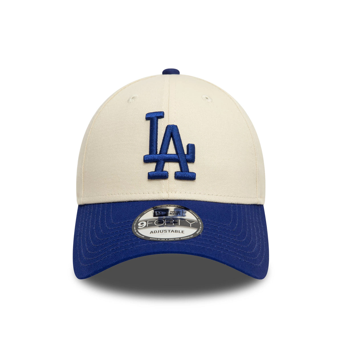 LA Dodgers Colour Block Cream New Era 9FORTY Adjustable Cap, front view showing the blue embroidered LA logo on the cream front panel, curved blue visor with a 9FORTY size sticker, and matching top button.