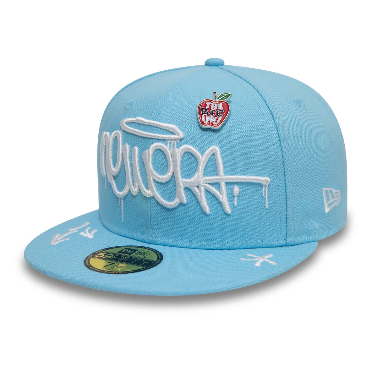 New Era Graphic Pastel Blue New Era 59FIFTY Fitted Cap, front view with white graffiti-style embroidered logo on the blue front panel, apple pin detail, and gold 59FIFTY size sticker on the visor.
