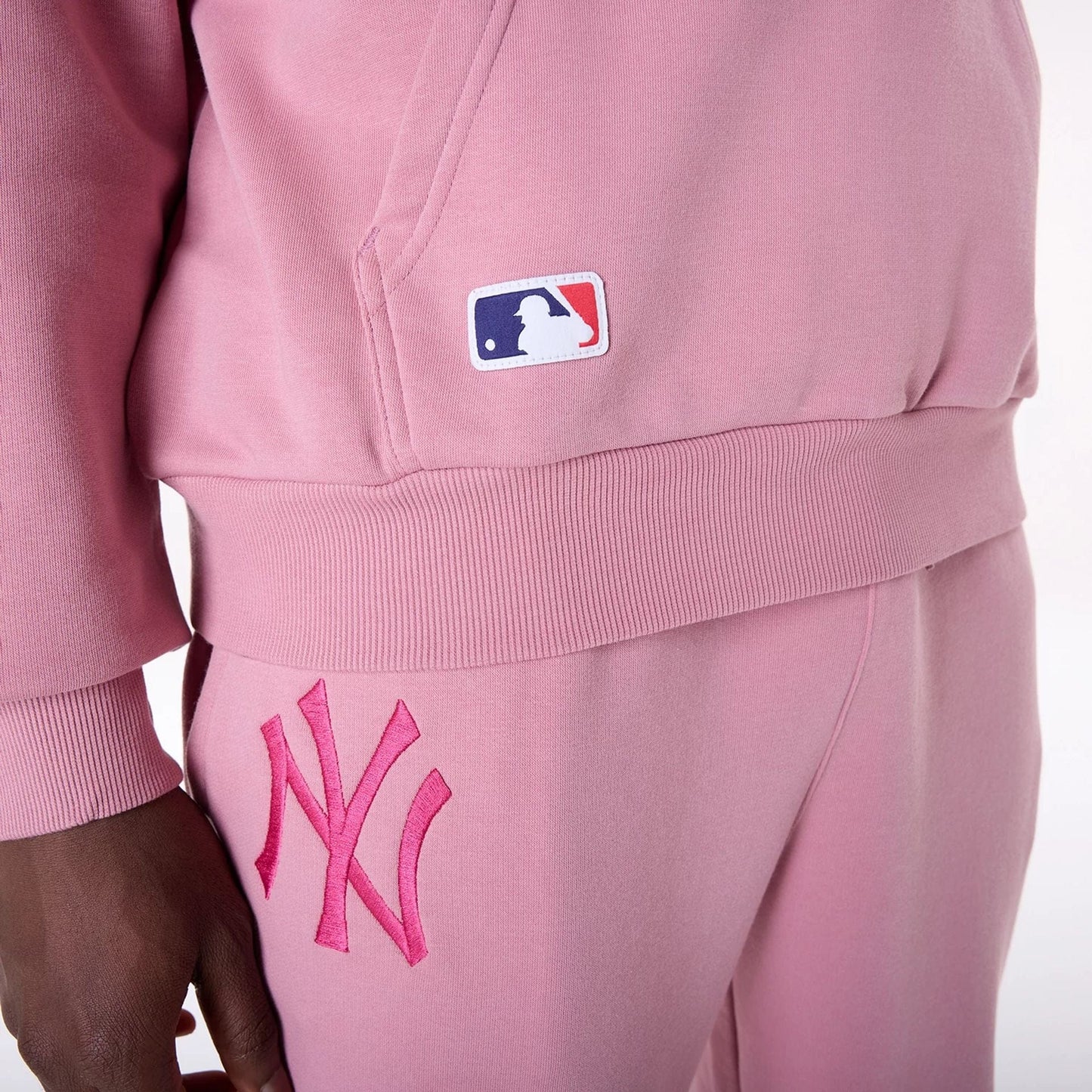 The Male model is wearing New York Yankees MLB League Essential Dark Pink Oversized Pullover Hoodie 5