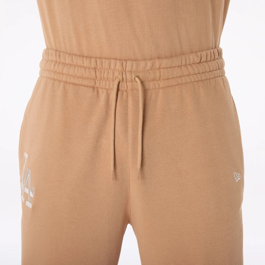 The Male model is wearing LA Dodgers MLB League Essential Dark Beige Fleece Joggers 6