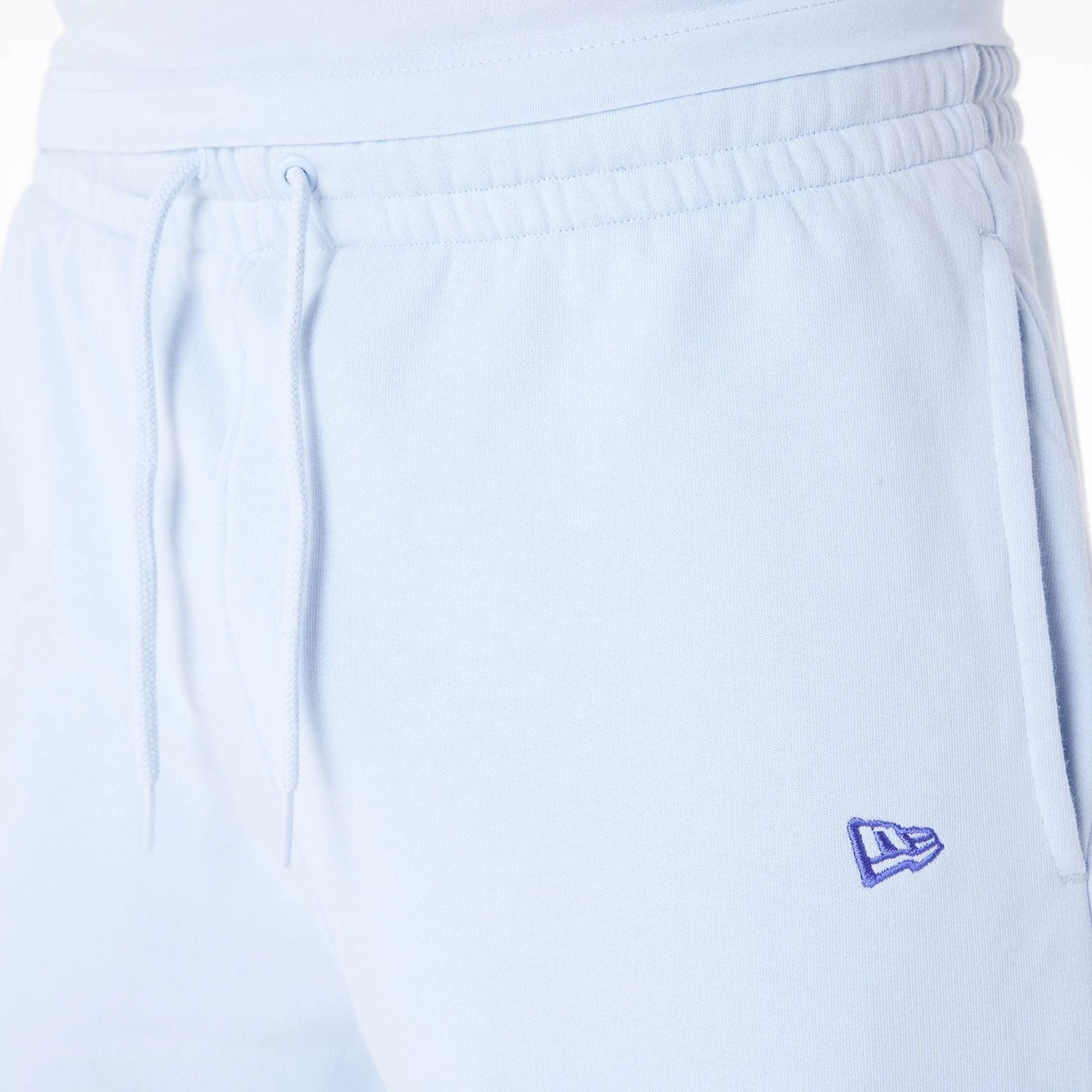The Male model is wearing Detroit Tigers MLB League Essential Pastel Blue Shorts 4